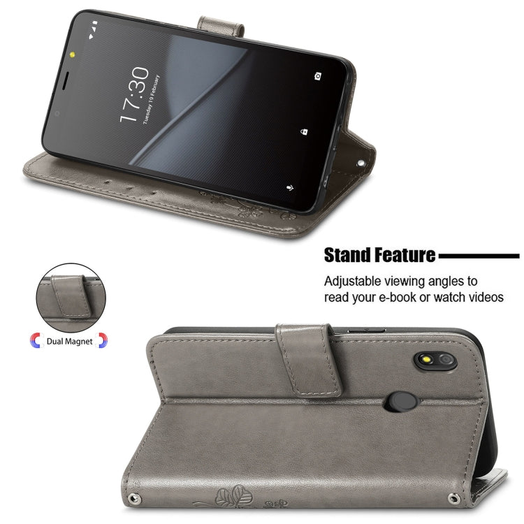 For Tecno Pop 3 Four-leaf Clasp Embossed Buckle Mobile Phone Protection Leather Case with Lanyard & Card Slot & Wallet & Bracket Function