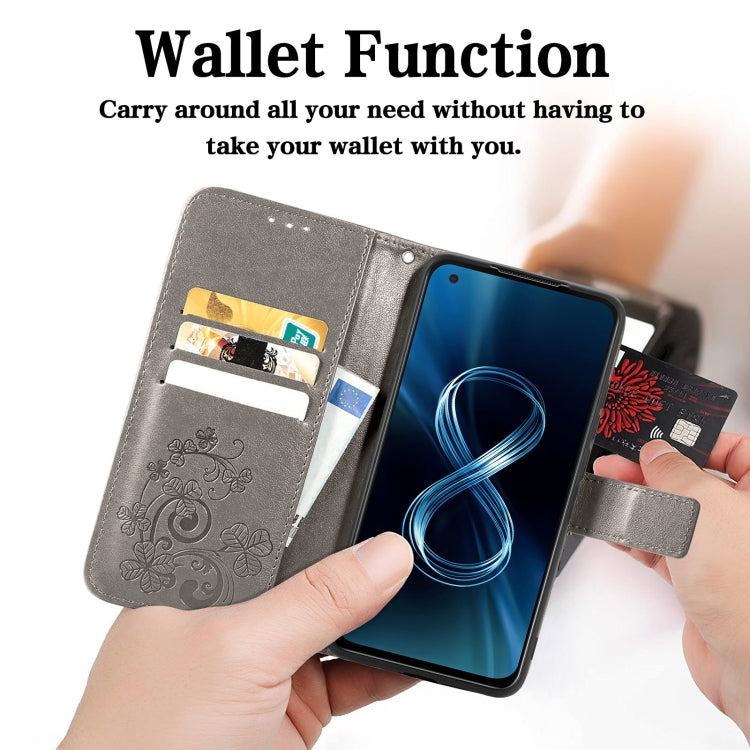 For Asus Zenfone 8 ZS590KS Four-leaf Clasp Embossed Buckle Mobile Phone Protection Leather Case with Lanyard & Card Slot & Wallet & Bracket Function