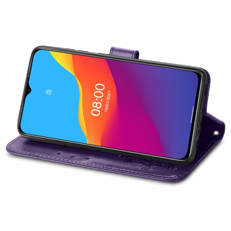 For Ulefone Note 10 Four-leaf Clasp Embossed Buckle Mobile Phone Protection Leather Case with Lanyard & Card Slot & Wallet & Bracket Function