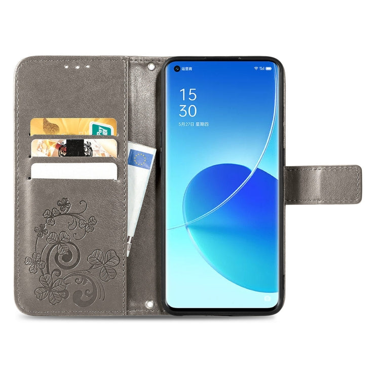For OPPO Reno6 Pro Four-leaf Clasp Embossed Buckle Mobile Phone Protection Leather Case with Lanyard & Card Slot & Wallet & Bracket Function