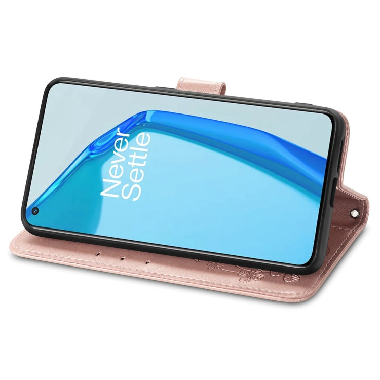 For OnePlus 9R Four-leaf Clasp Embossed Buckle Mobile Phone Protection Leather Case with Lanyard & Card Slot & Wallet & Bracket Function