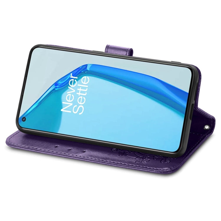 For OnePlus 9R Four-leaf Clasp Embossed Buckle Mobile Phone Protection Leather Case with Lanyard & Card Slot & Wallet & Bracket Function