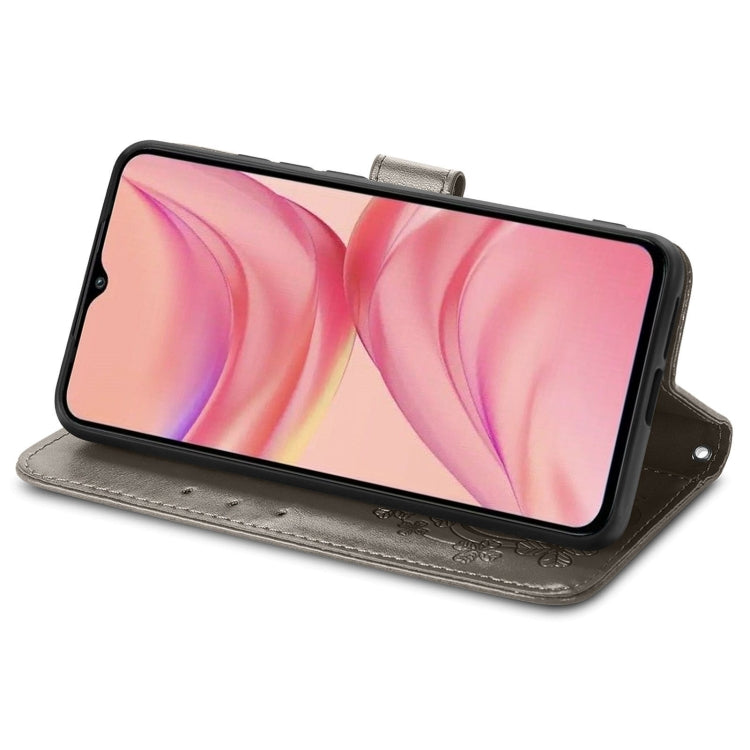 For Infinix Hot 10 Lite Four-leaf Clasp Embossed Buckle Mobile Phone Protection Leather Case with Lanyard & Card Slot & Wallet & Bracket Function