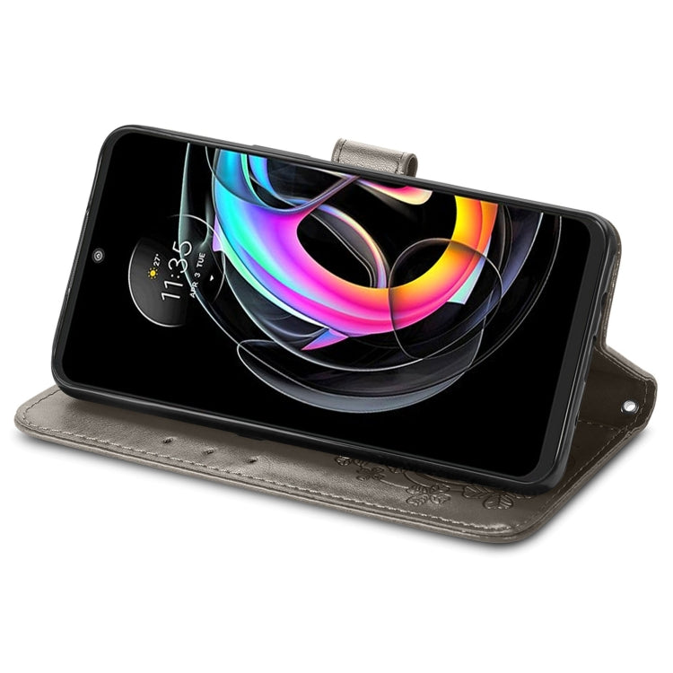 For Motorola Edge 20 Lite Four-leaf Clasp Embossed Buckle Mobile Phone Protection Leather Case with Lanyard & Card Slot & Wallet & Bracket Function