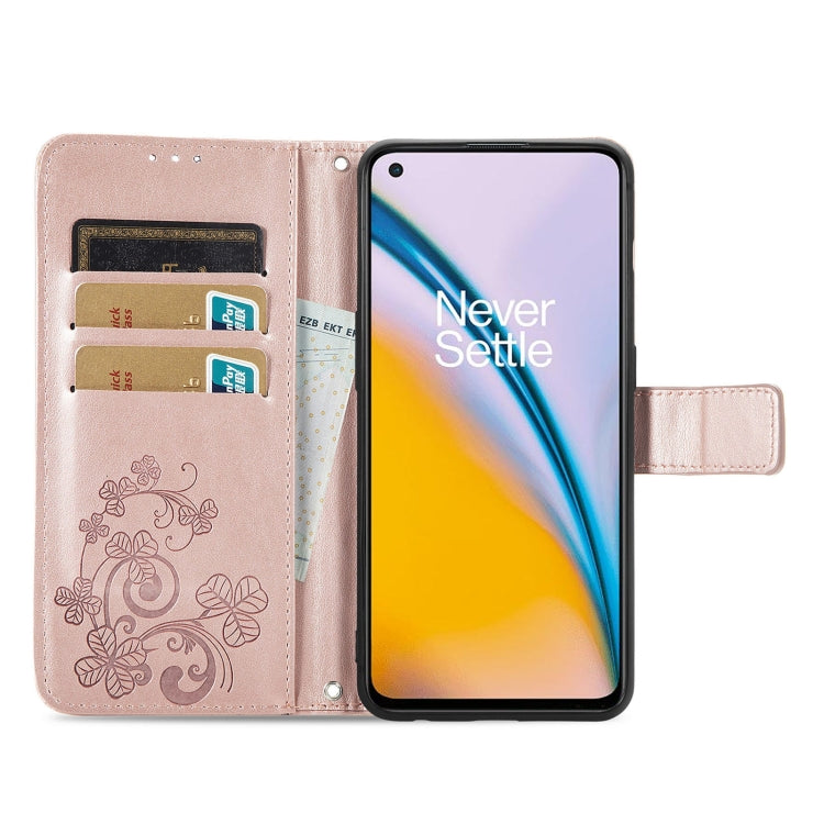 For OnePlus Nord 2 5G Four-leaf Clasp Embossed Buckle Mobile Phone Protection Leather Case with Lanyard & Card Slot & Wallet & Bracket Function