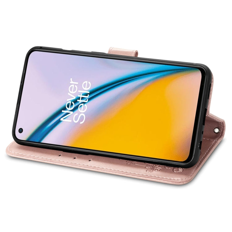 For OnePlus Nord 2 5G Four-leaf Clasp Embossed Buckle Mobile Phone Protection Leather Case with Lanyard & Card Slot & Wallet & Bracket Function