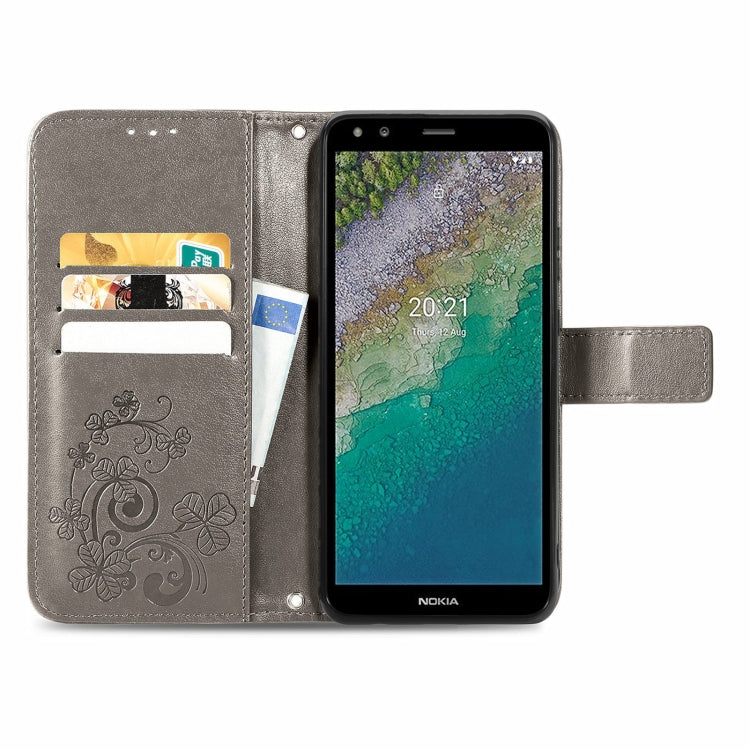 For Nokia C01 Plus Four-leaf Clasp Embossed Buckle Mobile Phone Protection Leather Case with Lanyard & Card Slot & Wallet & Bracket Function