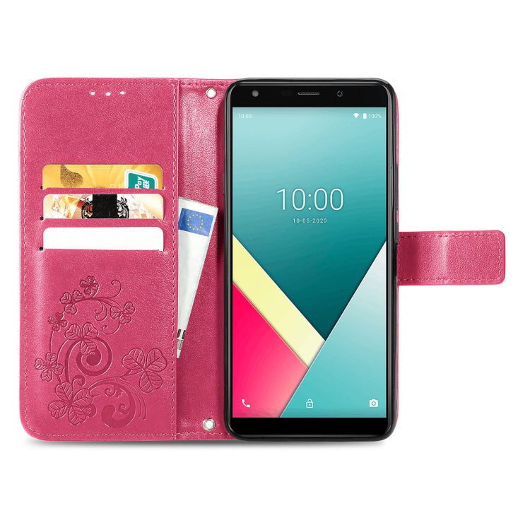 For Wiko Y61 Four-leaf Clasp Embossed Buckle Mobile Phone Protection Leather Case with Lanyard & Card Slot & Wallet & Bracket Function