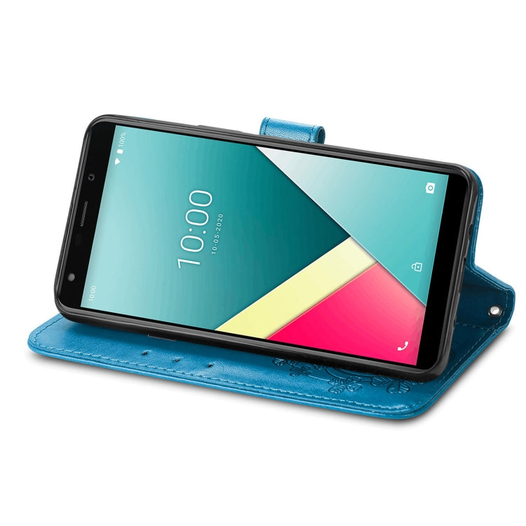 For Wiko Y61 Four-leaf Clasp Embossed Buckle Mobile Phone Protection Leather Case with Lanyard & Card Slot & Wallet & Bracket Function