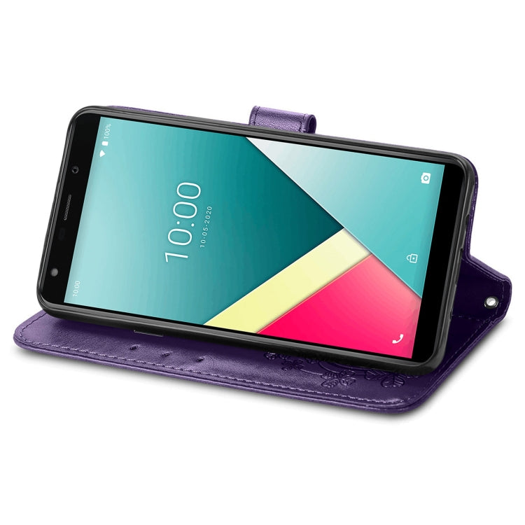 For Wiko Y61 Four-leaf Clasp Embossed Buckle Mobile Phone Protection Leather Case with Lanyard & Card Slot & Wallet & Bracket Function