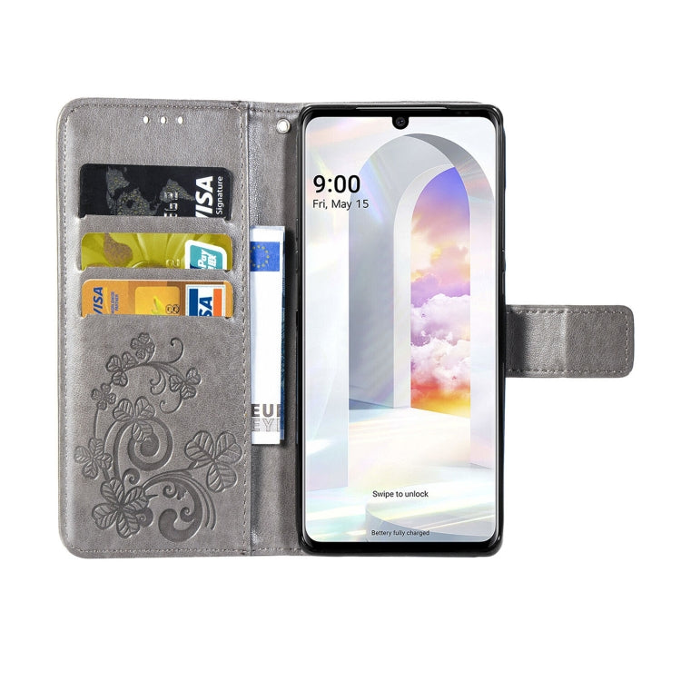 For LG Velvet 2 Pro Four-leaf Clasp Embossed Buckle Mobile Phone Protection Leather Case with Lanyard & Card Slot & Wallet & Bracket Function