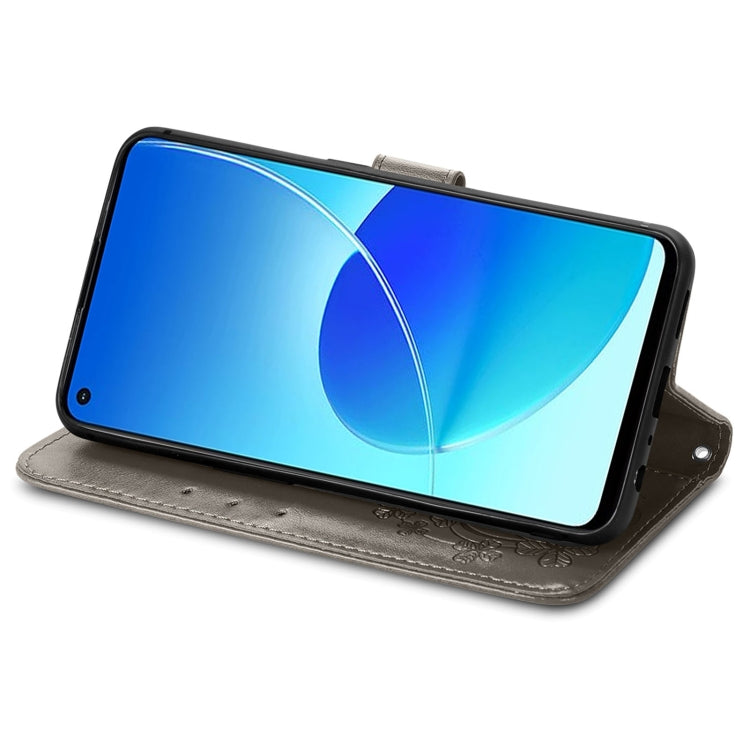 For OPPO Reno6 Z Four-leaf Clasp Embossed Buckle Mobile Phone Protection Leather Case with Lanyard & Card Slot & Wallet & Bracket Function