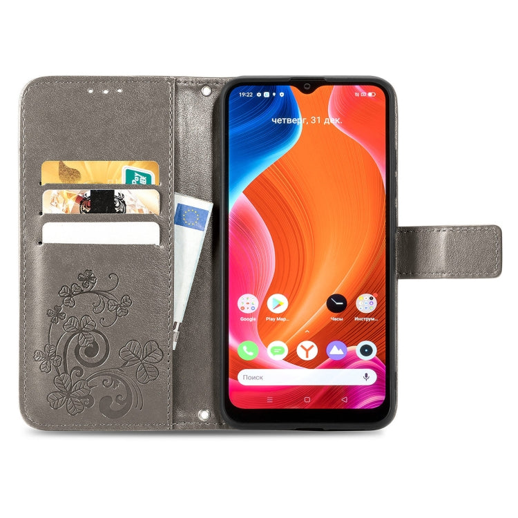 For OPPO Realme C20 Four-leaf Clasp Embossed Buckle Mobile Phone Protection Leather Case with Lanyard & Card Slot & Wallet & Bracket Function