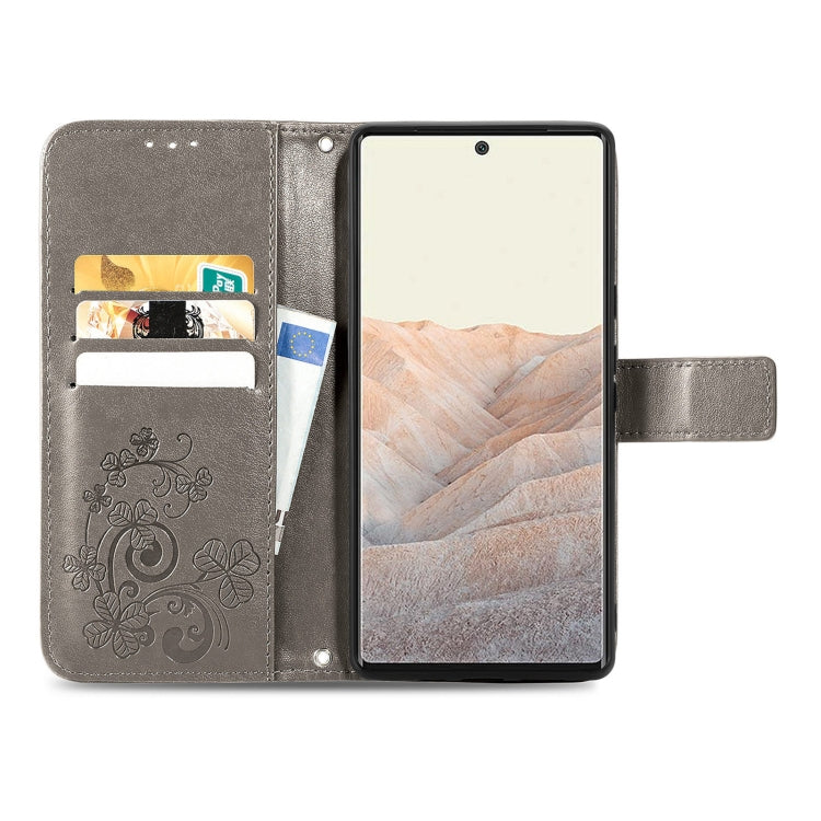 For Google Pixel 6 Four-leaf Clasp Embossed Leather Case with Lanyard & Card Slot & Wallet & Holder
