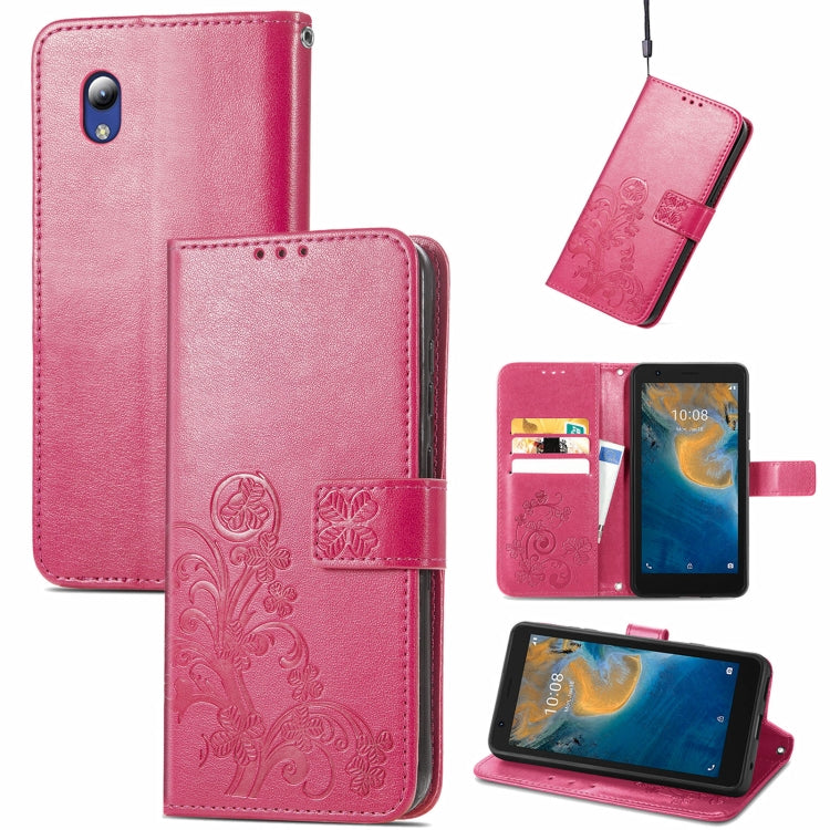 For ZTE Blade A31 Lite Four-leaf Clasp Embossed Leather Case with Lanyard & Card Slot & Wallet & Holder