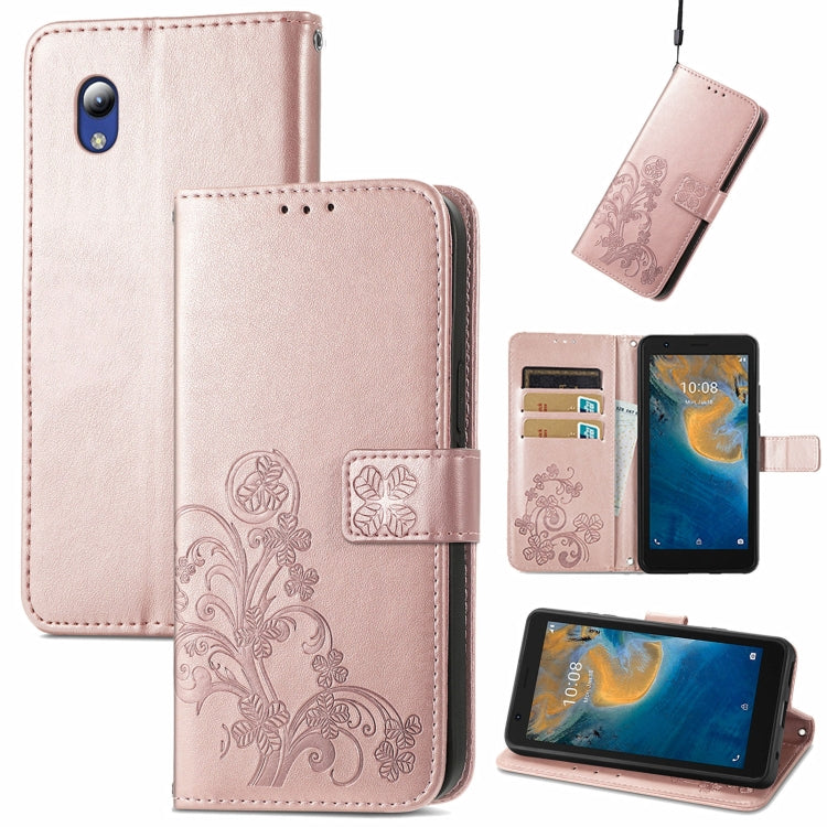 For ZTE Blade A31 Lite Four-leaf Clasp Embossed Leather Case with Lanyard & Card Slot & Wallet & Holder
