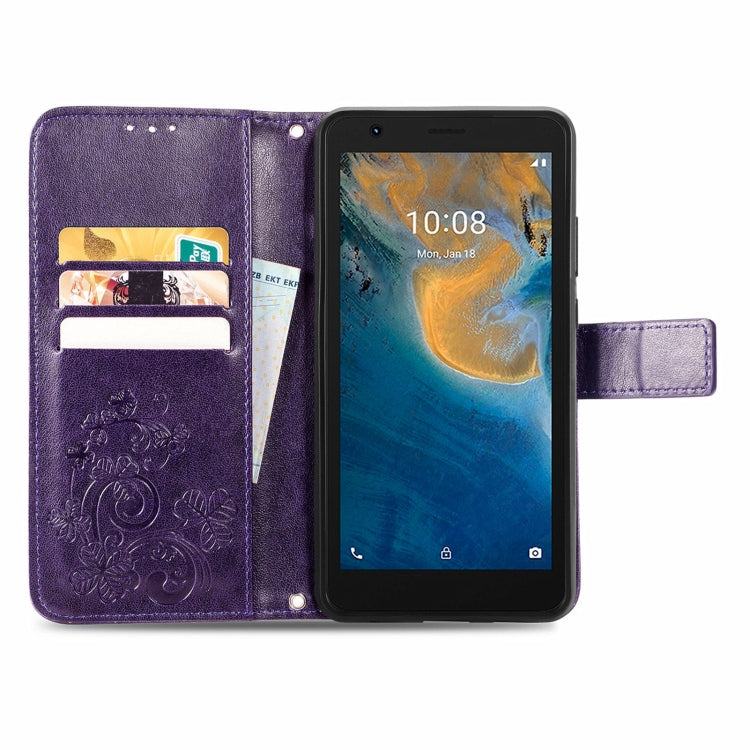 For ZTE Blade A31 Lite Four-leaf Clasp Embossed Leather Case with Lanyard & Card Slot & Wallet & Holder