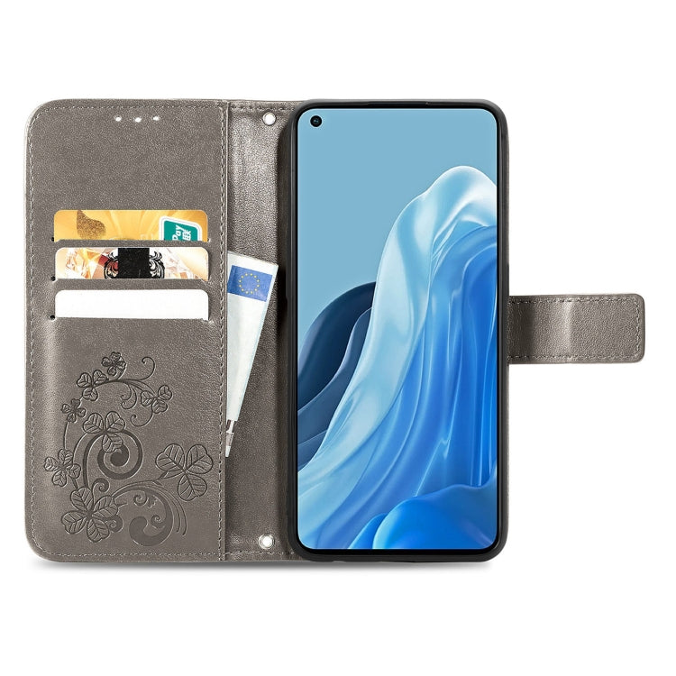 For OPPO Reno7 Pro 5G Four-leaf Clasp Embossed Buckle Leather Phone Case