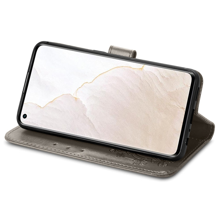 For OPPO Realme GT Explorer Master Four-leaf Clasp Embossed Buckle Leather Phone Case