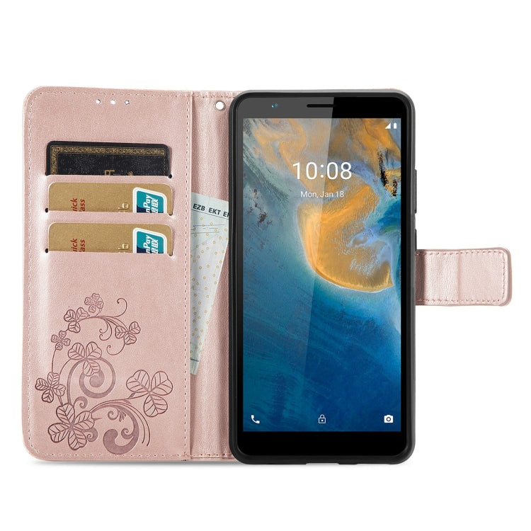 For ZTE Blade A31 Four-leaf Clasp Embossed Buckle Mobile Phone Leather Case