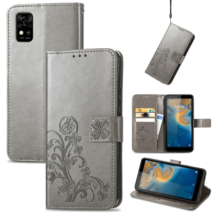 For ZTE Blade A31 Four-leaf Clasp Embossed Buckle Mobile Phone Leather Case