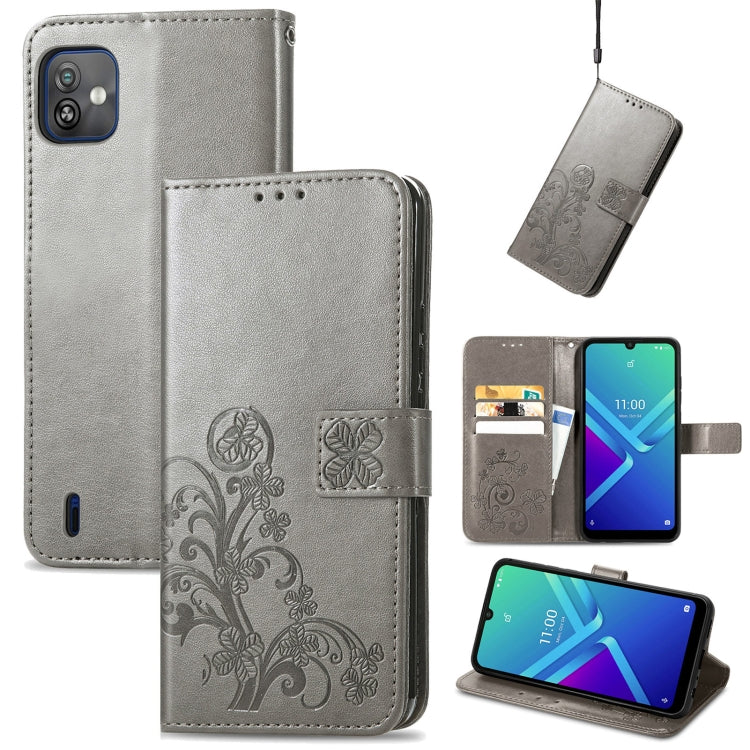 For Wiko Y82 Four-leaf Clasp Embossed Buckle Leather Phone Case