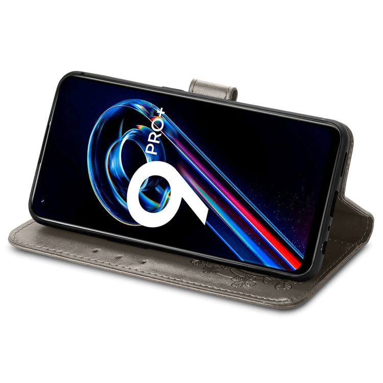 For OPPO Realme 9 Pro+ 5G Four-leaf Clasp Embossed Buckle Leather Phone Case