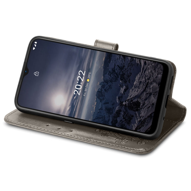 For Nokia G21 Four-leaf Clasp Embossed Buckle Leather Phone Case