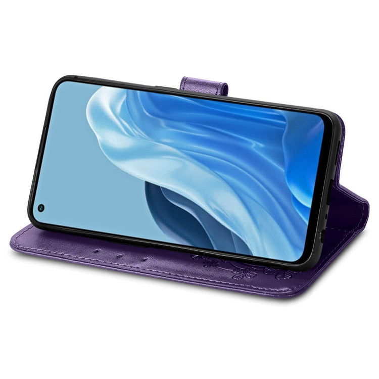 For OPPO Reno7 4G Four-leaf Clasp Embossed Buckle Leather Phone Case