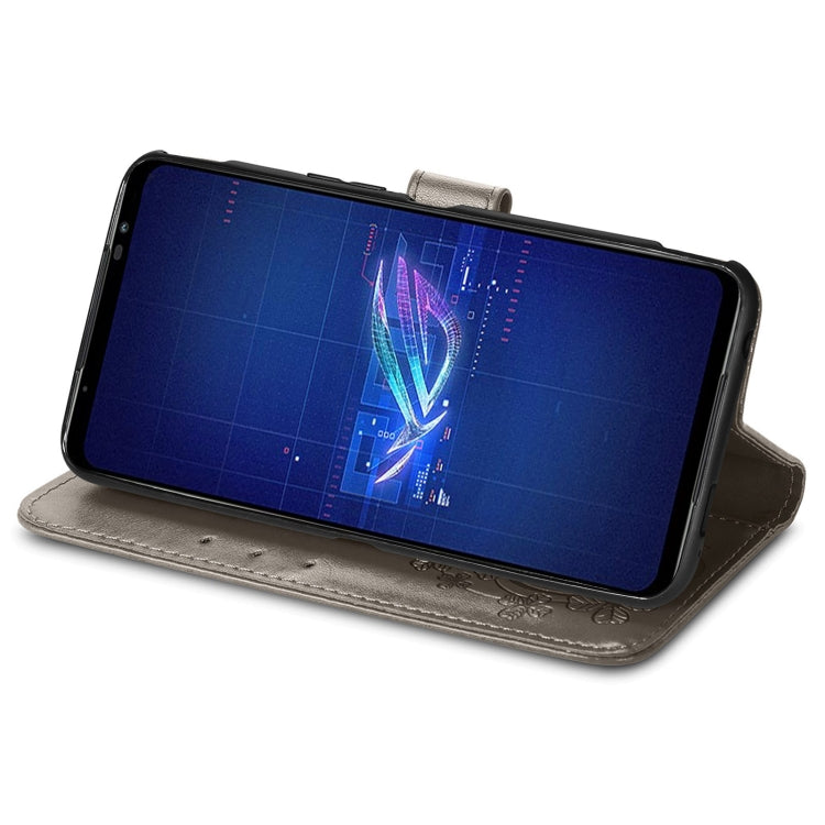 For Asus ROG Phone 6 Four-leaf Clasp Embossed Buckle Leather Phone Case