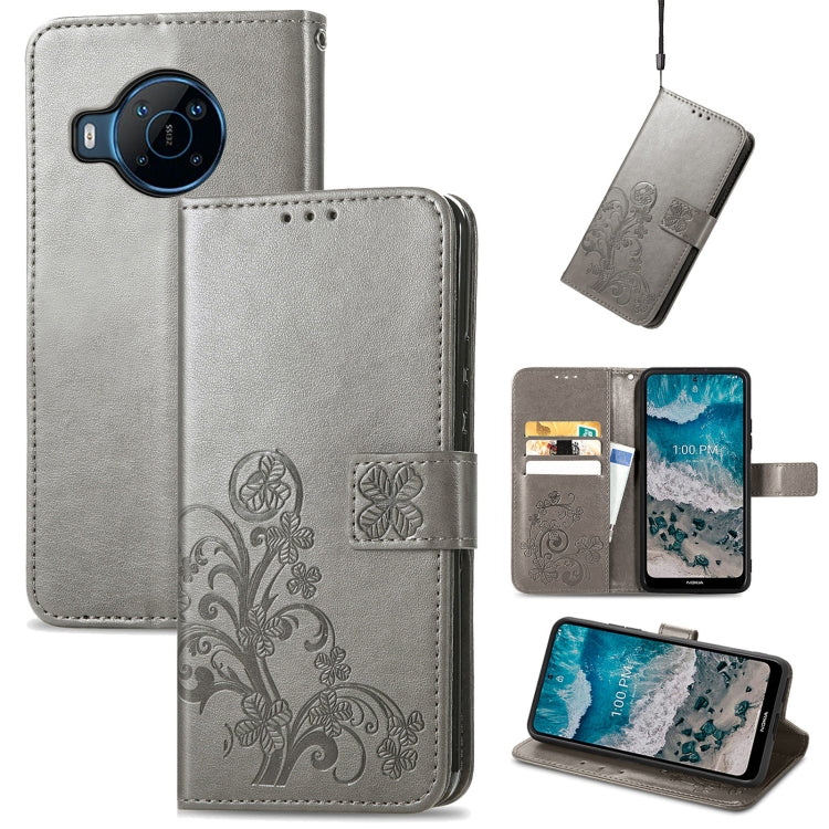 For Nokia X100 5G Four-leaf Clasp Embossed Buckle Leather Phone Case