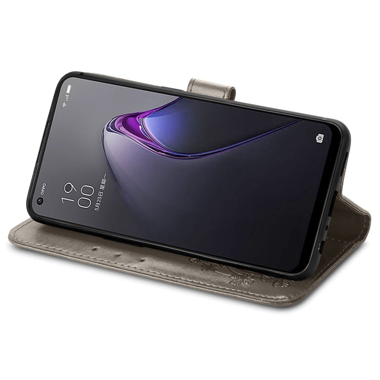 For OPPO Reno8 5G Four-leaf Clasp Embossed Buckle Leather Phone Case