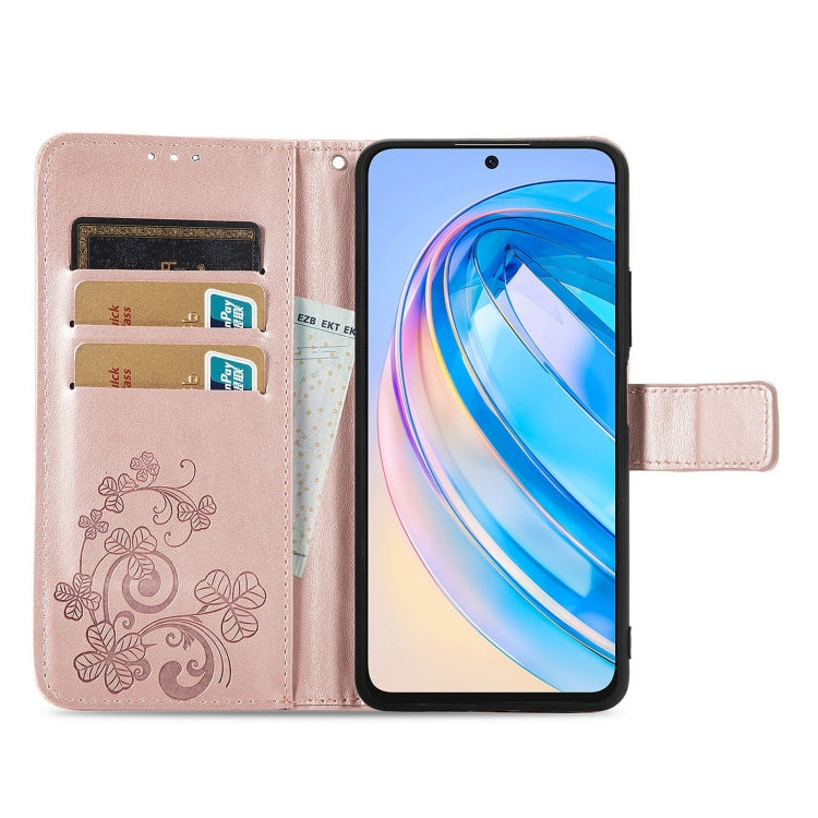 For Honor X8A Four-leaf Clasp Embossed Buckle Leather Phone Case