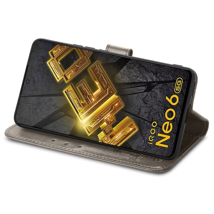 For vivo iQOO Neo6 Four-leaf Clasp Embossed Buckle Leather Phone Case