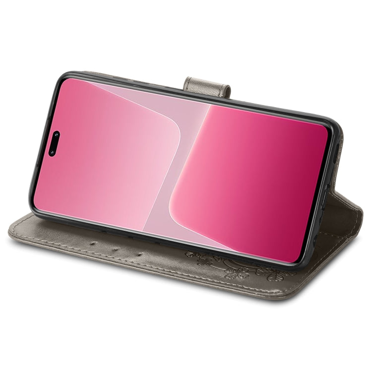 For Xiaomi 13 Lite Four-leaf Clasp Embossed Buckle Leather Phone Case