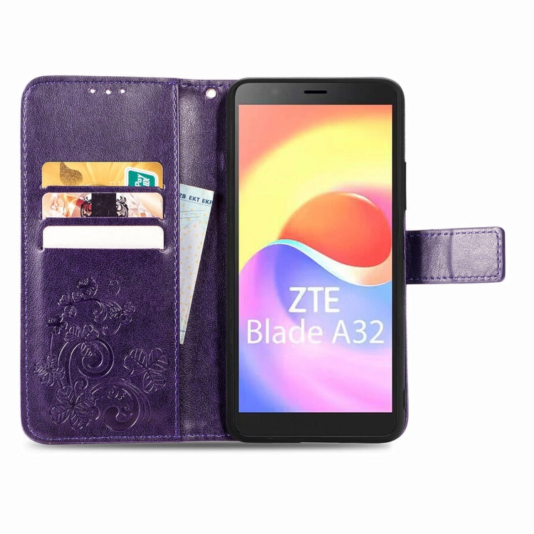 For ZTE Blade A32 Four-leaf Clasp Embossed Buckle Leather Phone Case