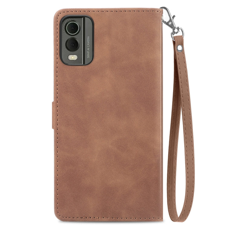 For Nokia C32 Embossed Flower Zipper Leather Phone Case