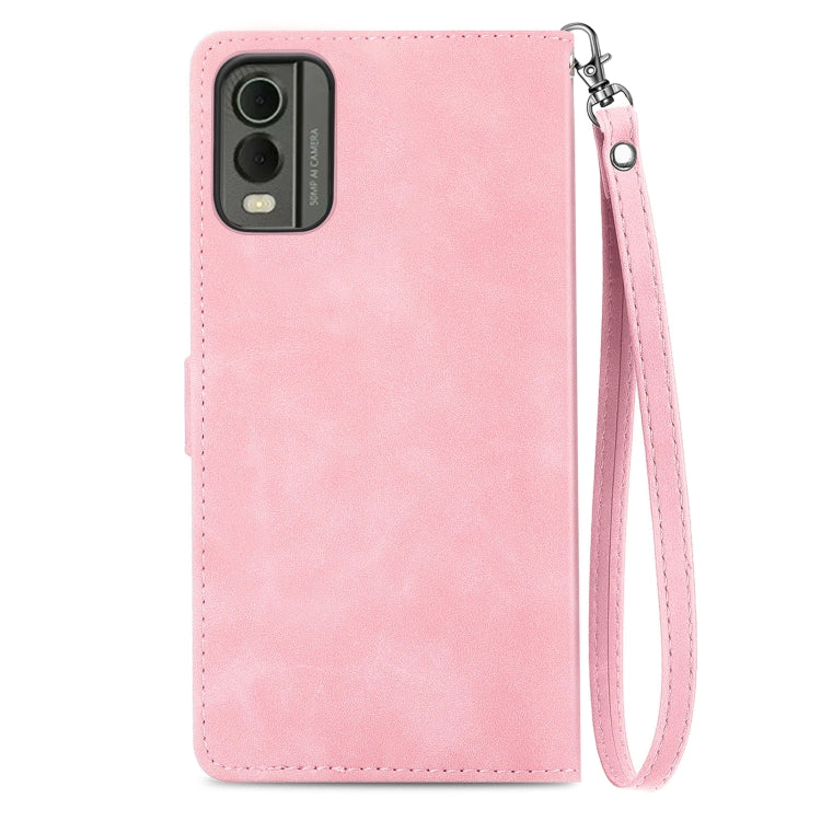 For Nokia C32 Embossed Flower Zipper Leather Phone Case