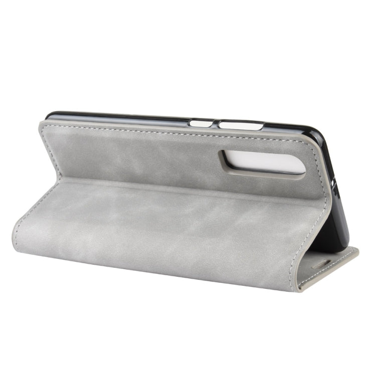 For Huawei P30 Retro-skin Business Magnetic Suction Leather Case with Holder & Card Slots & Wallet