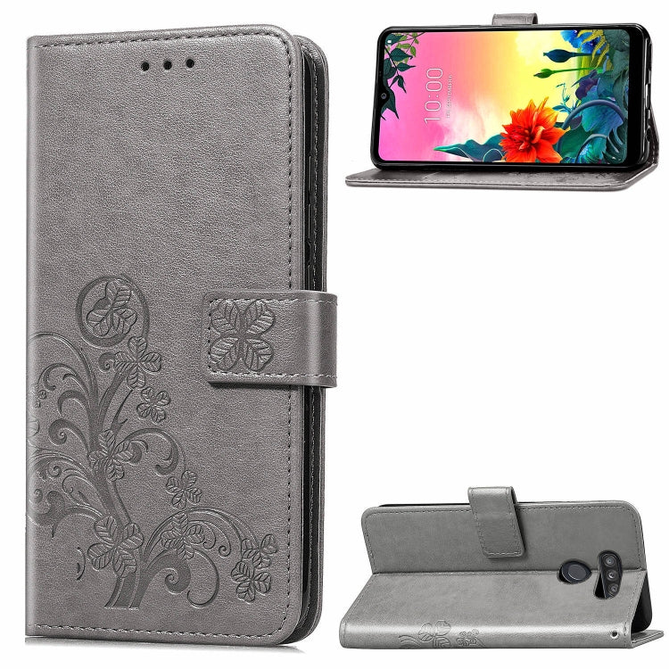 For LG K50S Four-leaf Clasp Embossed Buckle Mobile Phone Protection Leather Case with Lanyard & Card Slot & Wallet & Bracket Function