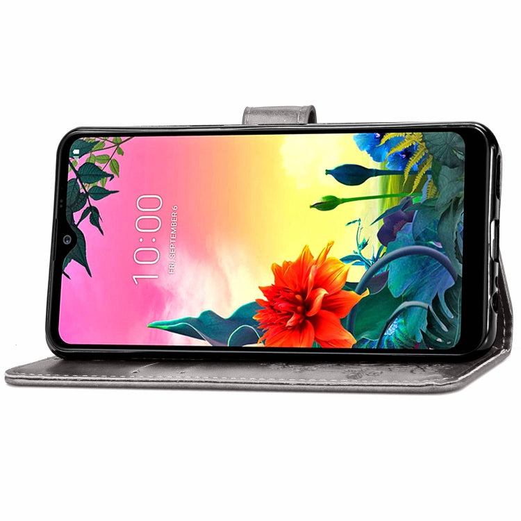 For LG K50S Four-leaf Clasp Embossed Buckle Mobile Phone Protection Leather Case with Lanyard & Card Slot & Wallet & Bracket Function