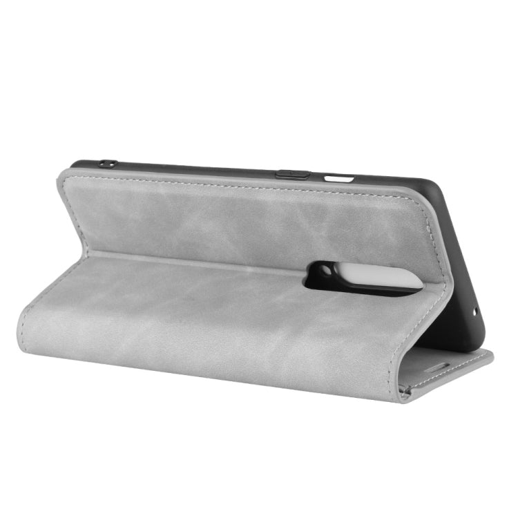 For OnePlus 8 Retro-skin Business Magnetic Suction Leather Case with Holder & Card Slots & Wallet