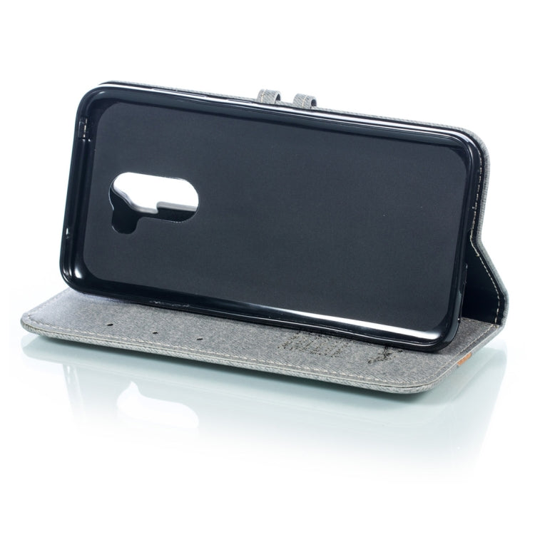 Splicing Embossed Male Style Horizontal Flip Leather Case for Xiaomi Pocophone F1, with Holder & Card Slots & Wallet & Lanyard