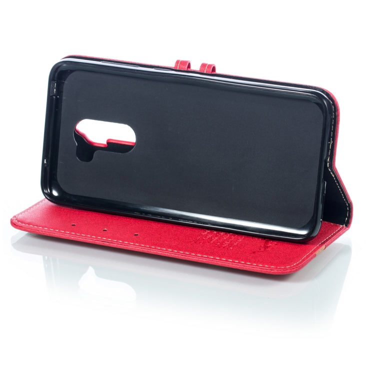 Splicing Embossed Male Style Horizontal Flip Leather Case for Xiaomi Pocophone F1, with Holder & Card Slots & Wallet & Lanyard