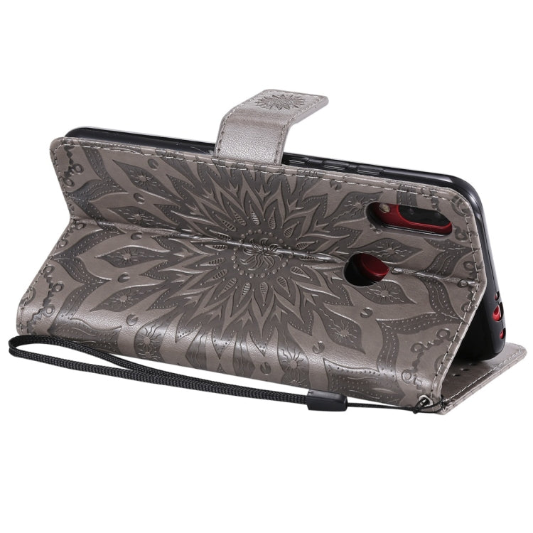 Sun Embossing Pattern Horizontal Flip Leather Case for Xiaomi Redmi Note 7, with Card Slot & Holder & Wallet & Lanyard