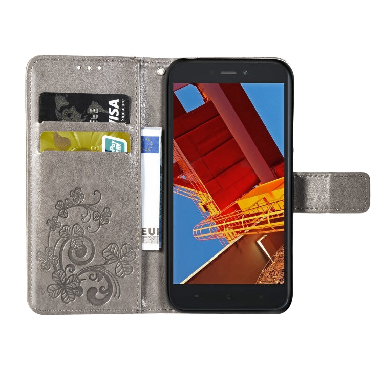 Lucky Clover Pressed Flowers Pattern Leather Case for Xiaomi Redmi Go, with Holder & Card Slots & Wallet & Hand Strap