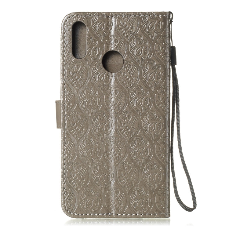 Pressed Printing Rattan Flower Pattern Horizontal Flip PU Leather Case for Huawei Y7 2019 / Enjoy 9, with Holder & Card Slots & Wallet & Photo Frame