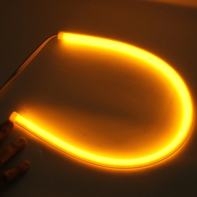 2 PCS 12V Car Daytime Running Lights Soft Article Lamp with Water Flowing Effect, White + Yellow Light, Length: 60cm