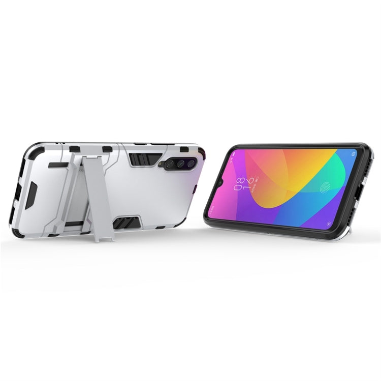 For Xiaomi Mi CC9e Shockproof PC + TPU Protective Case with Invisible Holder