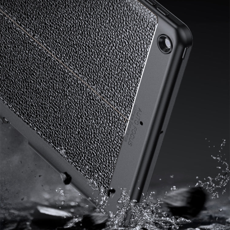Lychee Peel Texture Horizontal Deformation Flip TPU Leather Case with Three-folding Holder & Sleep / Wake-up Function For iPad Air (2019)
